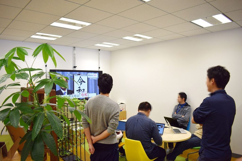 Green Loans Face Tighter Proof for the Label finance team reviewing company results in a meeting