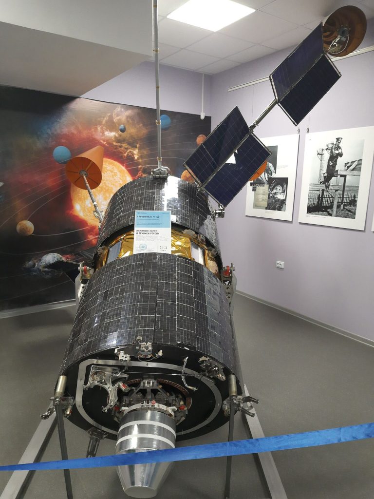 communications satellite orbiting above Earth