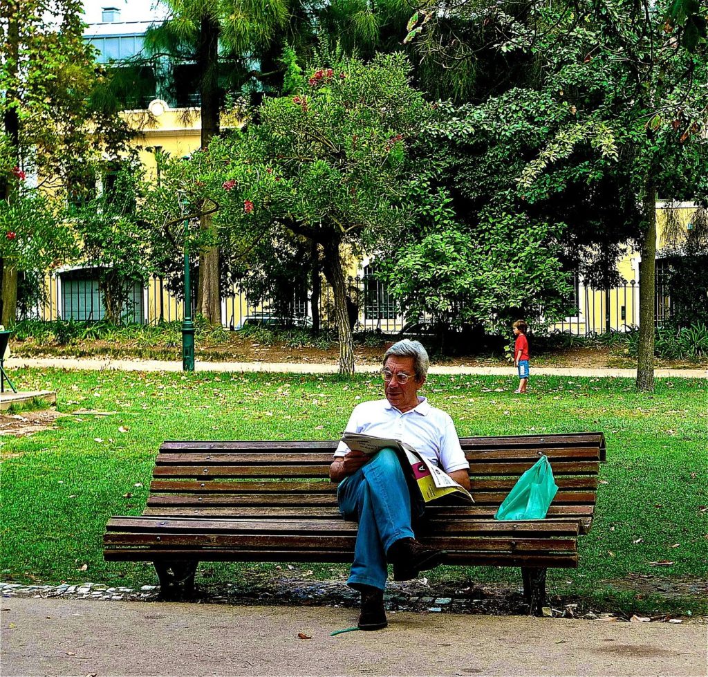 News Avoidance Rises as Audiences Manage Information Overload A person reading a newspaper