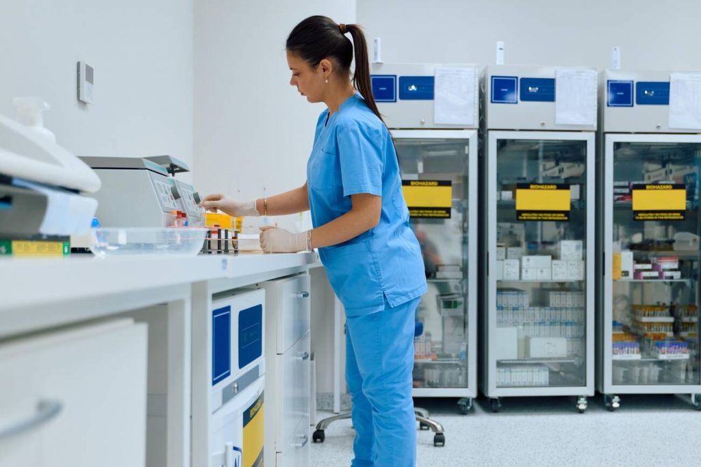 Alzheimer’s Blood Tests Are Changing Early Diagnosis A laboratory scientist handling blood test samples in a clinical laboratory
