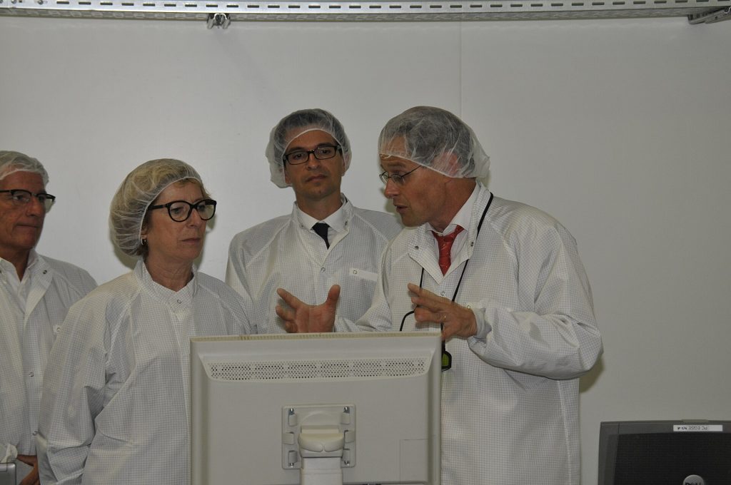Semiconductor wafer being inspected inside a chip factory clean room